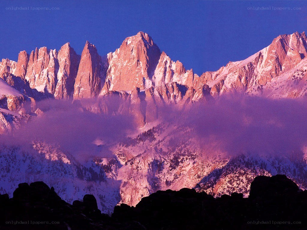 Snow-capped mountains at dawn