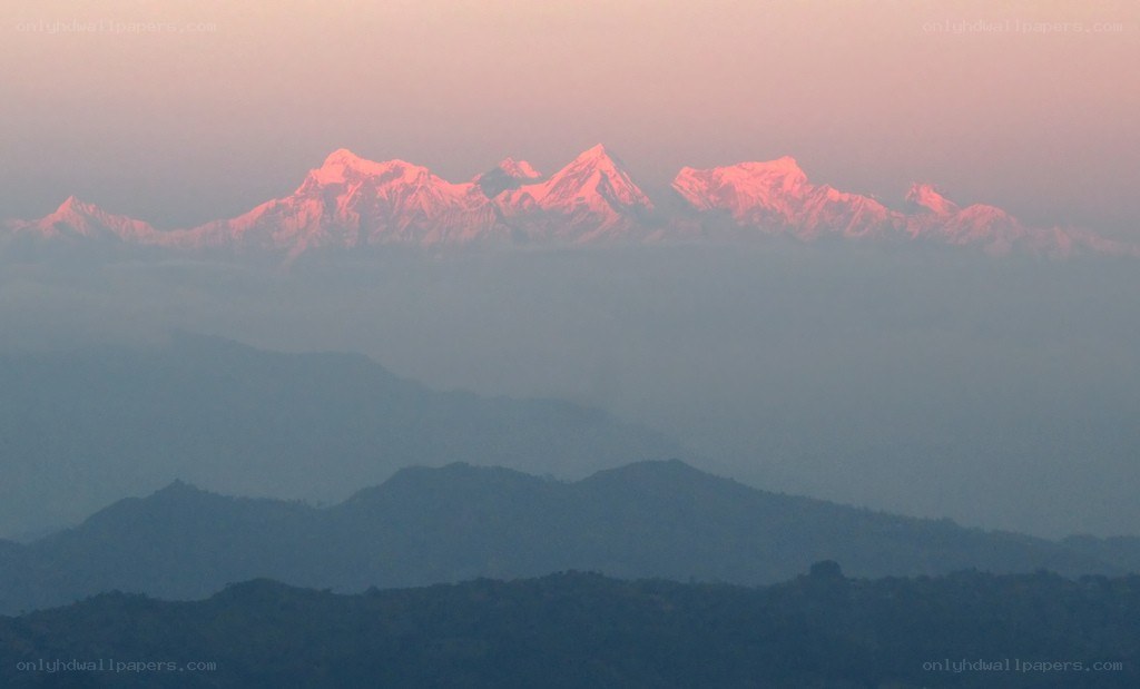 snow-capped mountains at dawn
