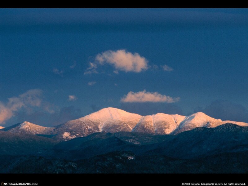 Snow-capped mountains at dawn