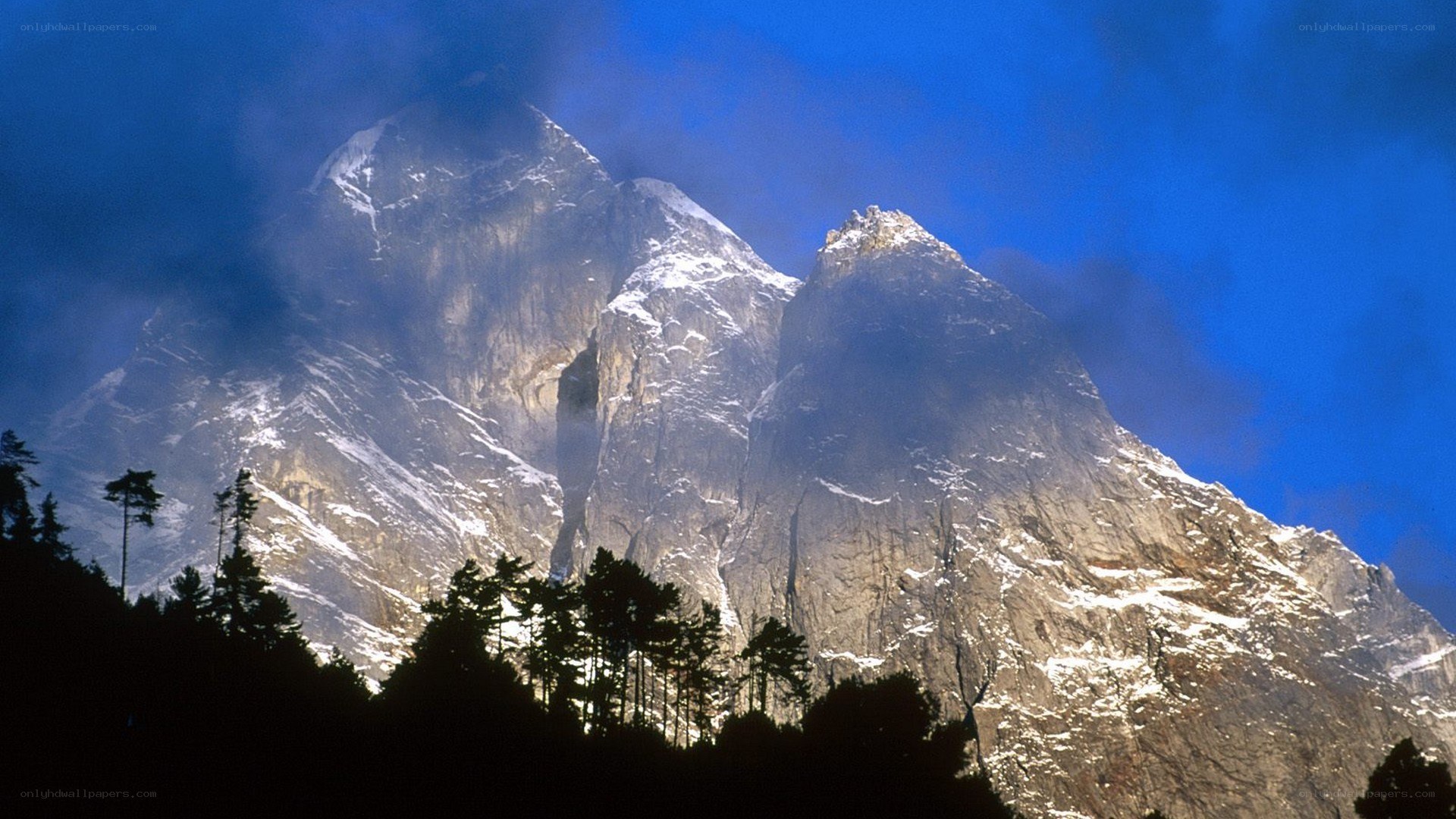 snow-capped mountains at dusk