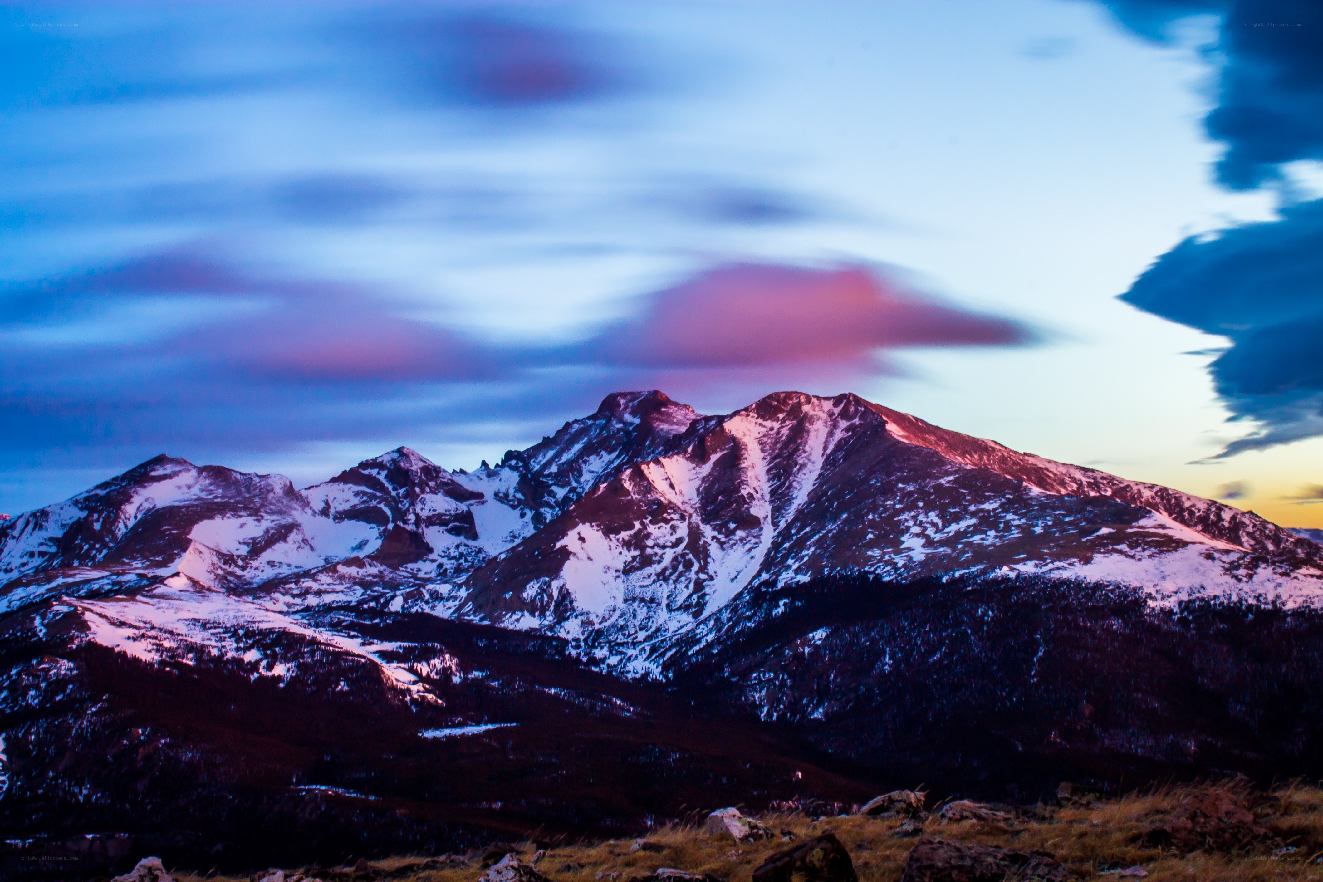 Snow-capped mountains at dusk