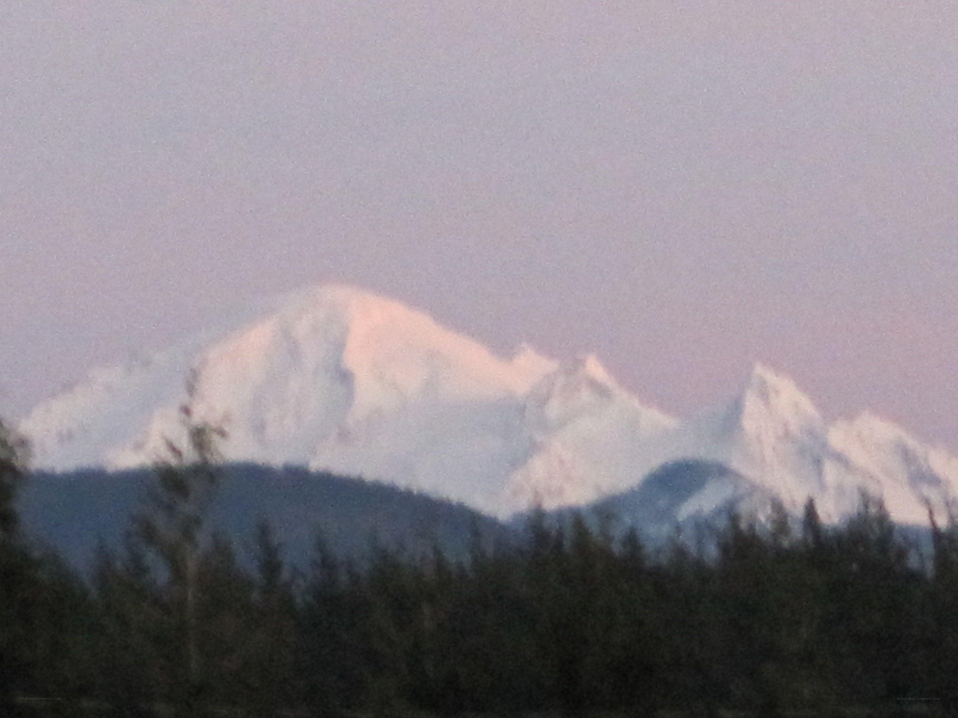 snow-capped mountains at dusk