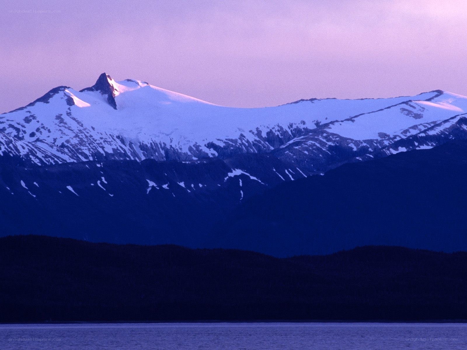 snow-capped mountains at dusk