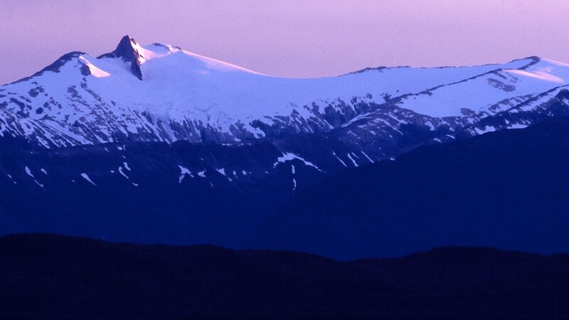 snow-capped mountains at dusk
