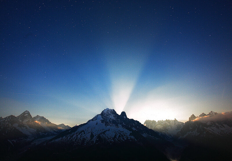 Snow-capped Mountains at Night