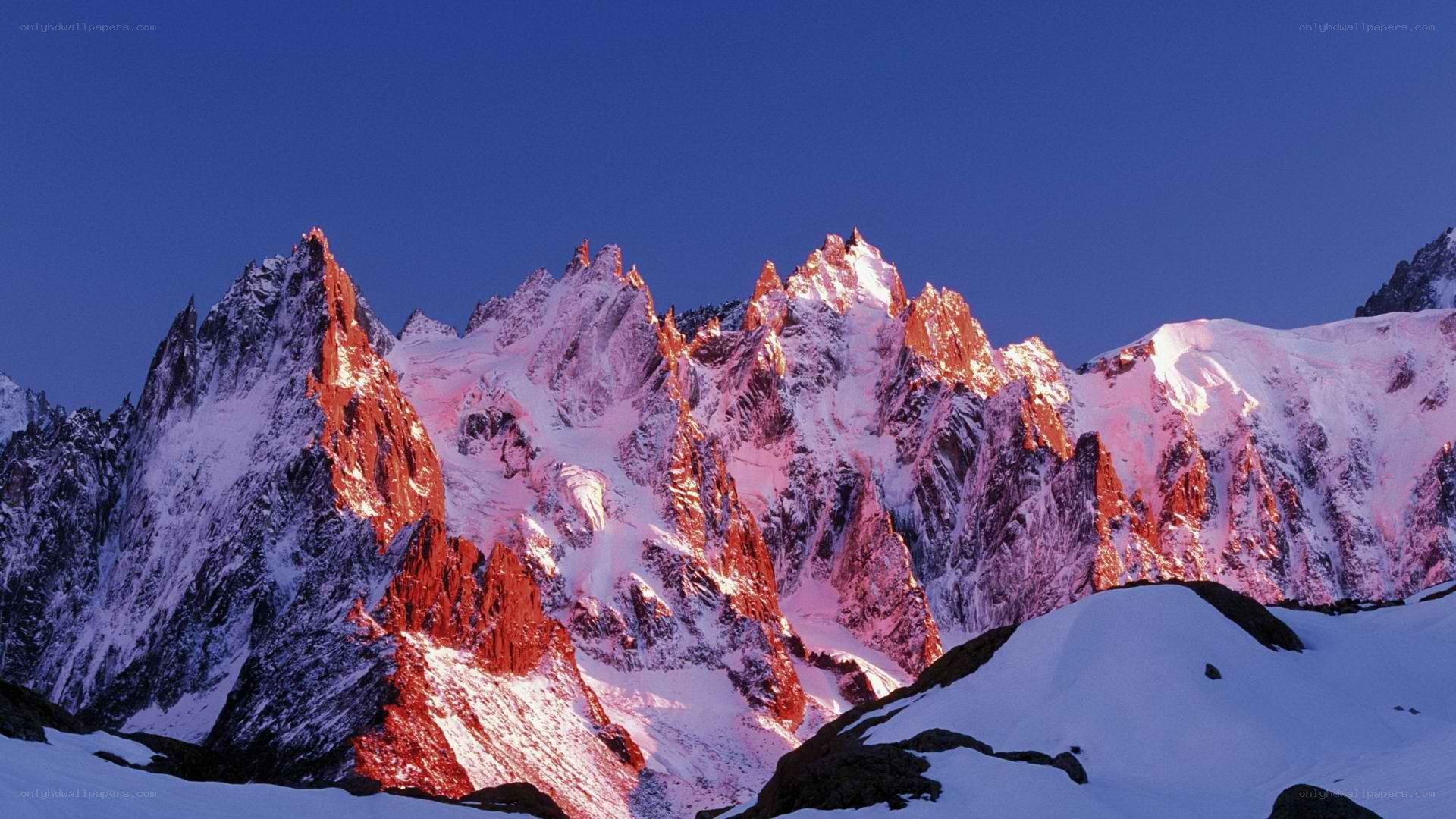 snow-capped mountains at sunrise