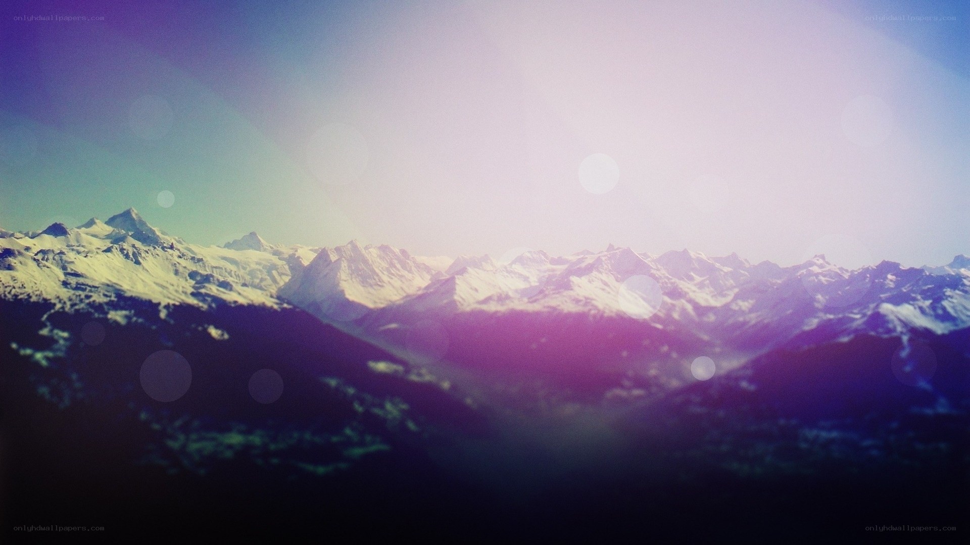 snow-capped mountains at sunrise
