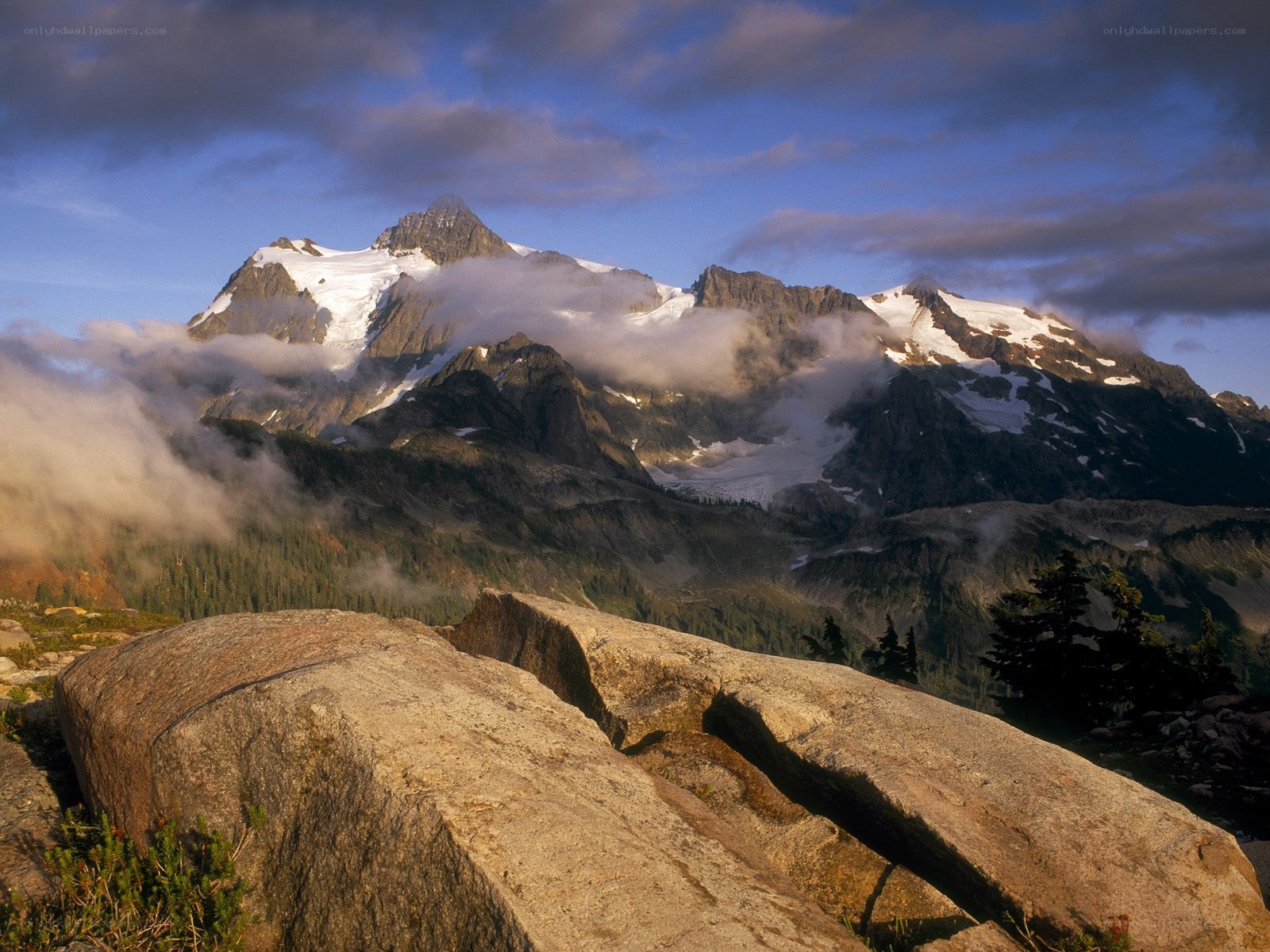 Snow-capped mountains at sunrise