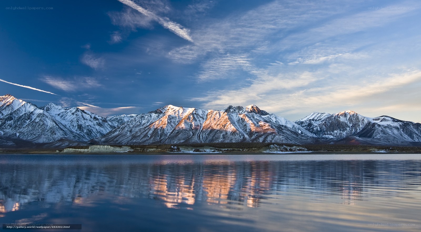 Snow-capped mountains at sunrise