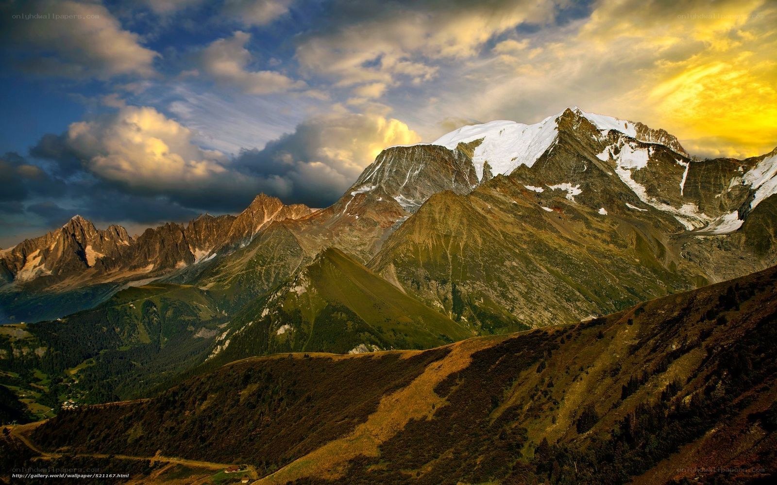 Snow-capped mountains at sunset