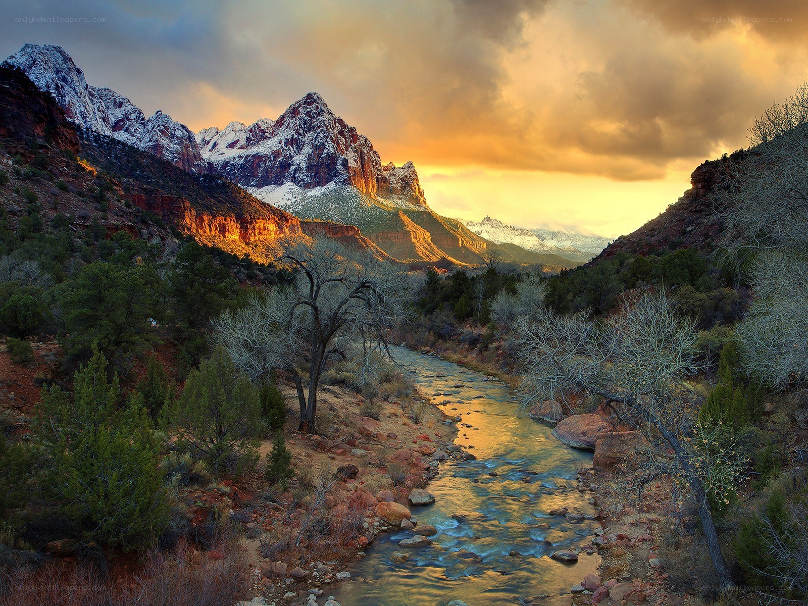 Snow-capped mountains at sunset