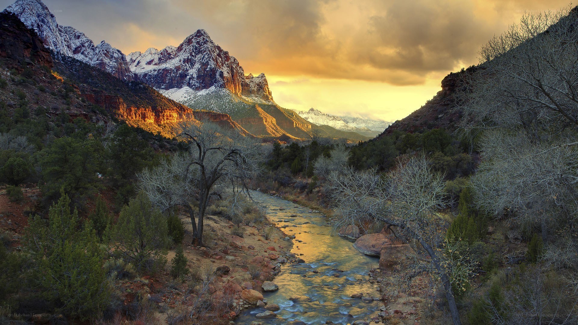 Snow-capped mountains at sunset
