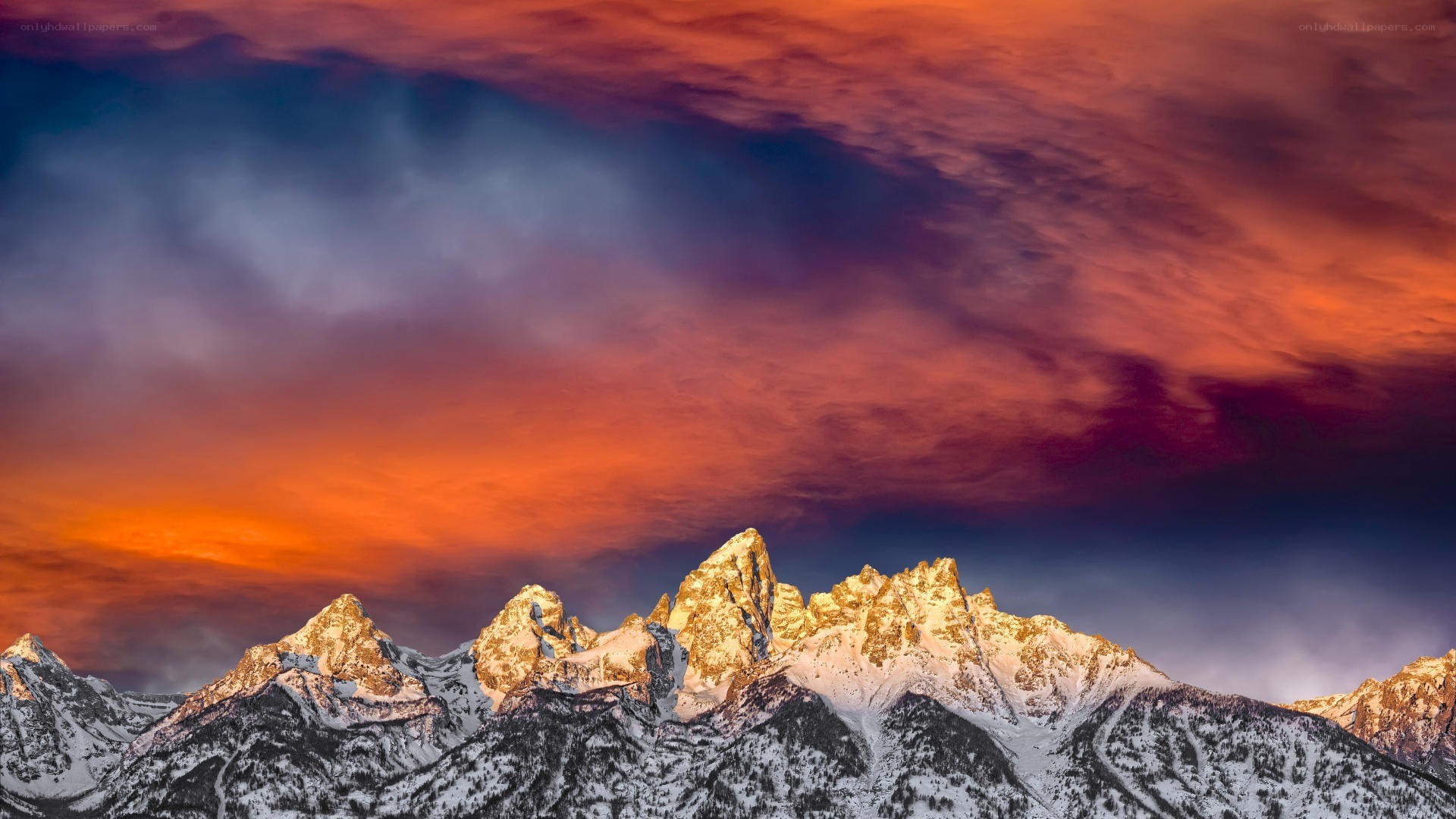 snow-capped mountains at sunset