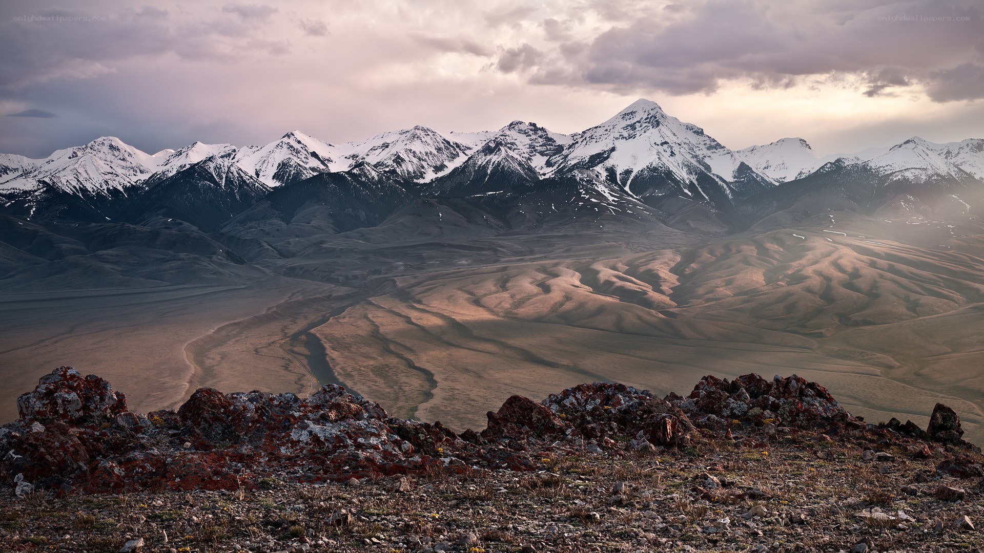 snow-capped mountains at sunset