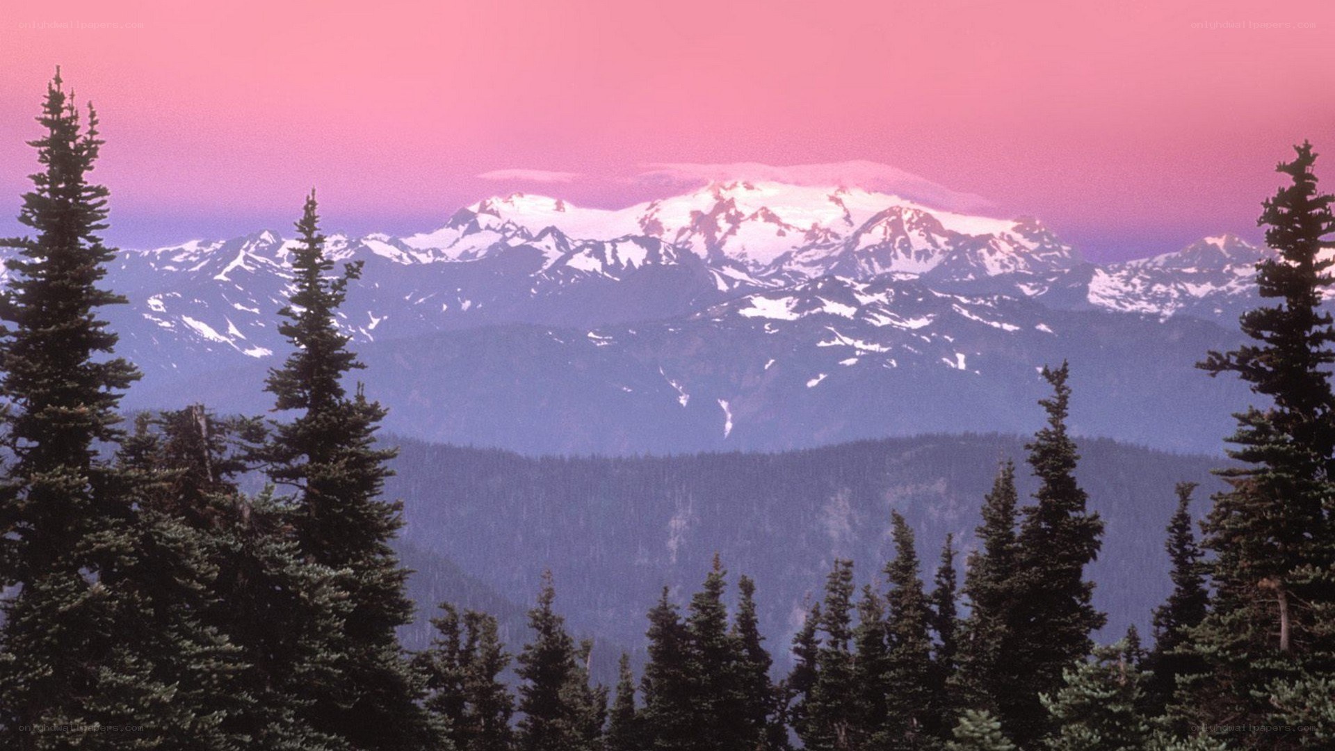 snow-capped mountains at sunset