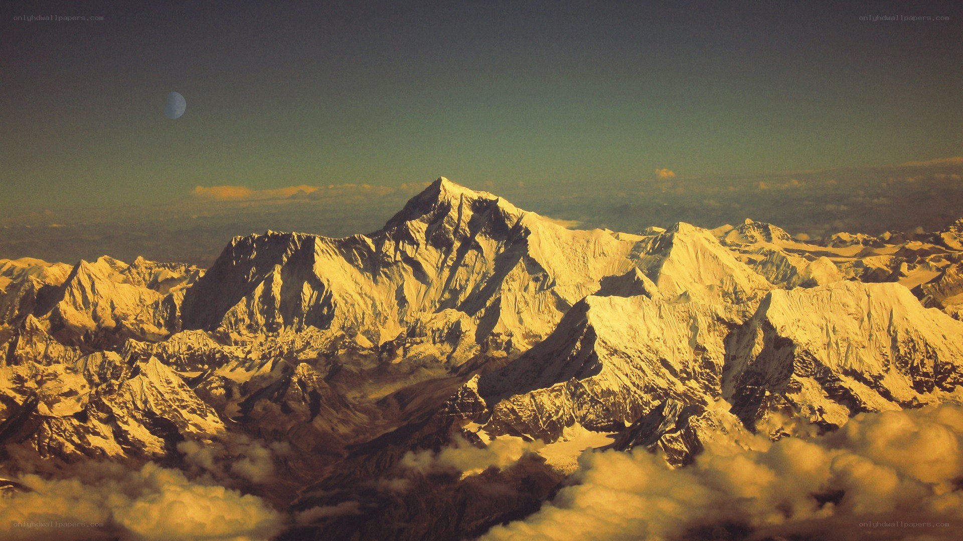 snow-capped mountains at sunset