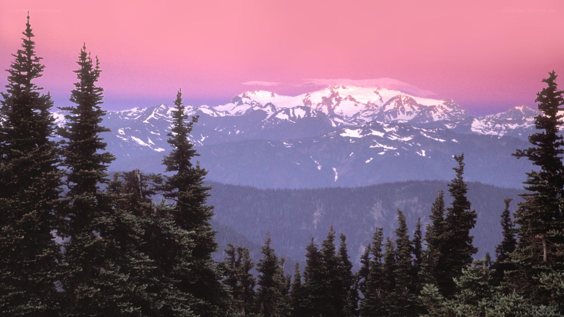 snow-capped mountains at sunset
