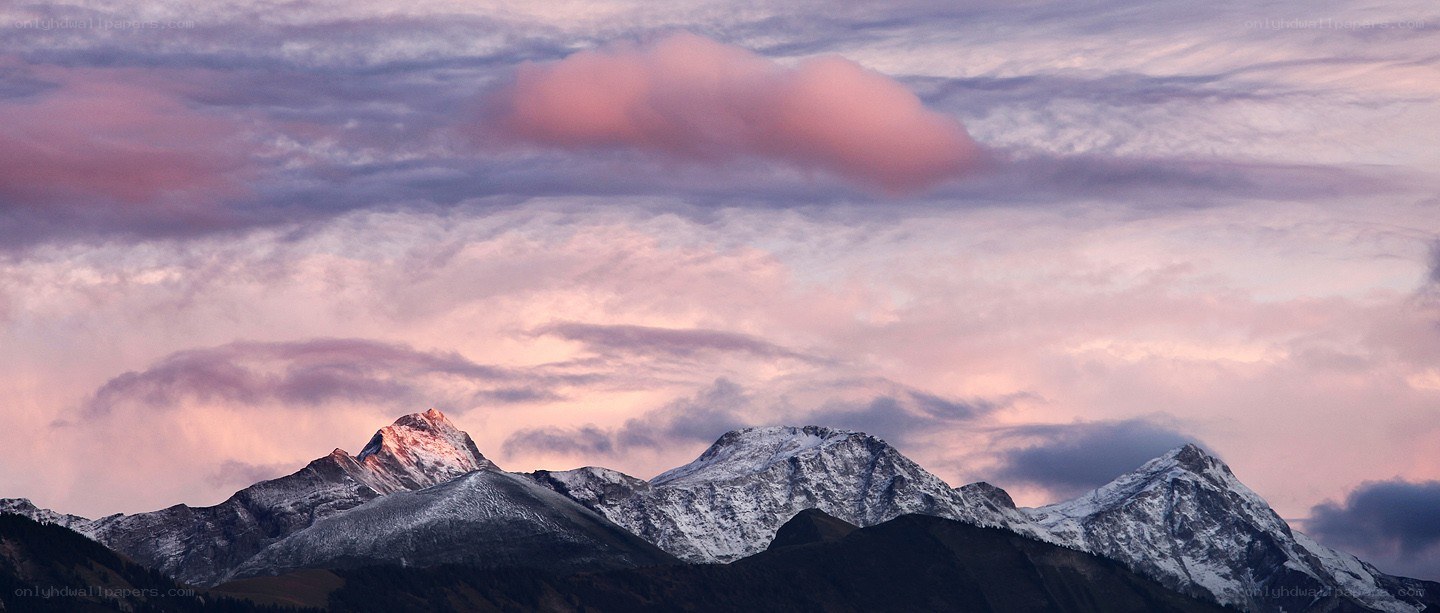 snow-capped mountains at sunset