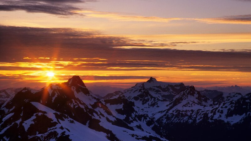 Snow-capped Mountains at Sunset — Orange, Dramatic, Photograph, Sun, Clouds