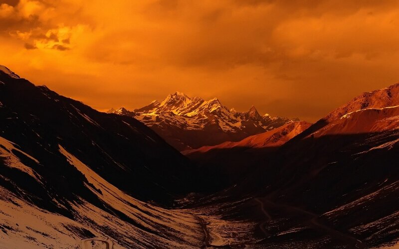 Snow-capped Mountains at Sunset — Orange, Dramatic, Photograph, Valley