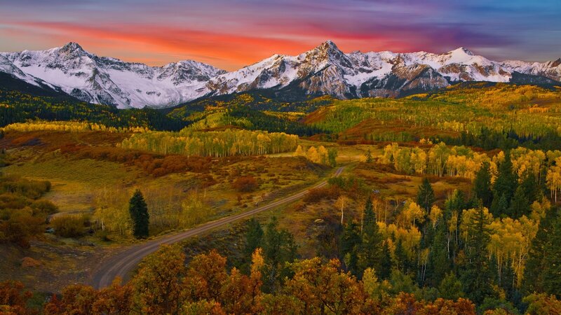 Snow-capped Mountains at Sunset — Orange, Serene
