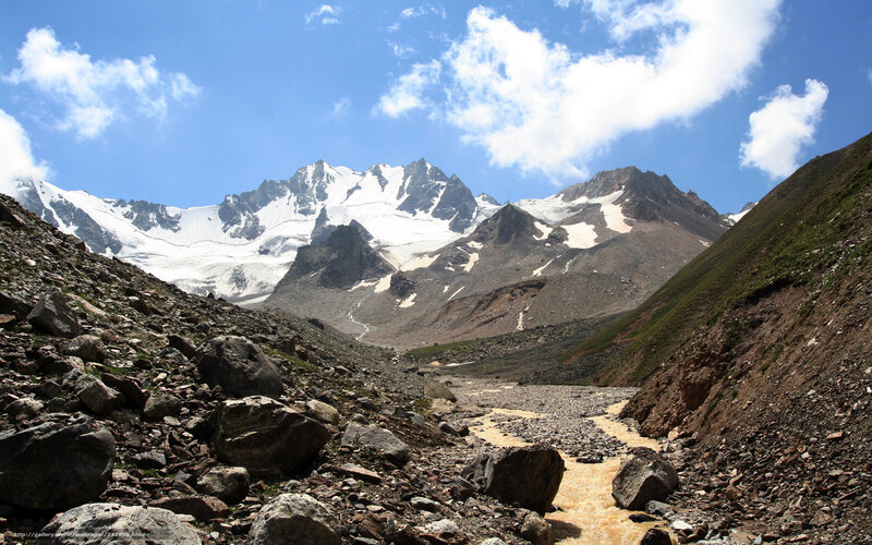 Snow-capped Mountains — Blue, Dramatic, Afternoon, Photograph, River, Rocks