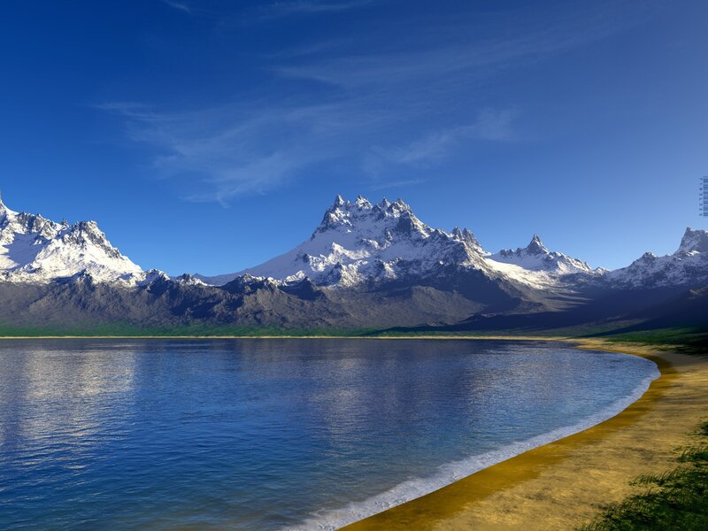 Snow-capped mountains by a lake