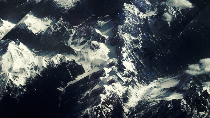 snow-capped mountains from space