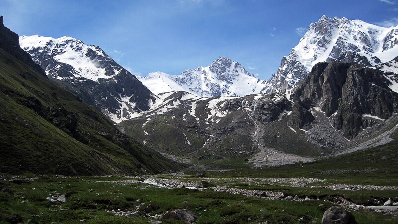 snow-capped mountains in a valley