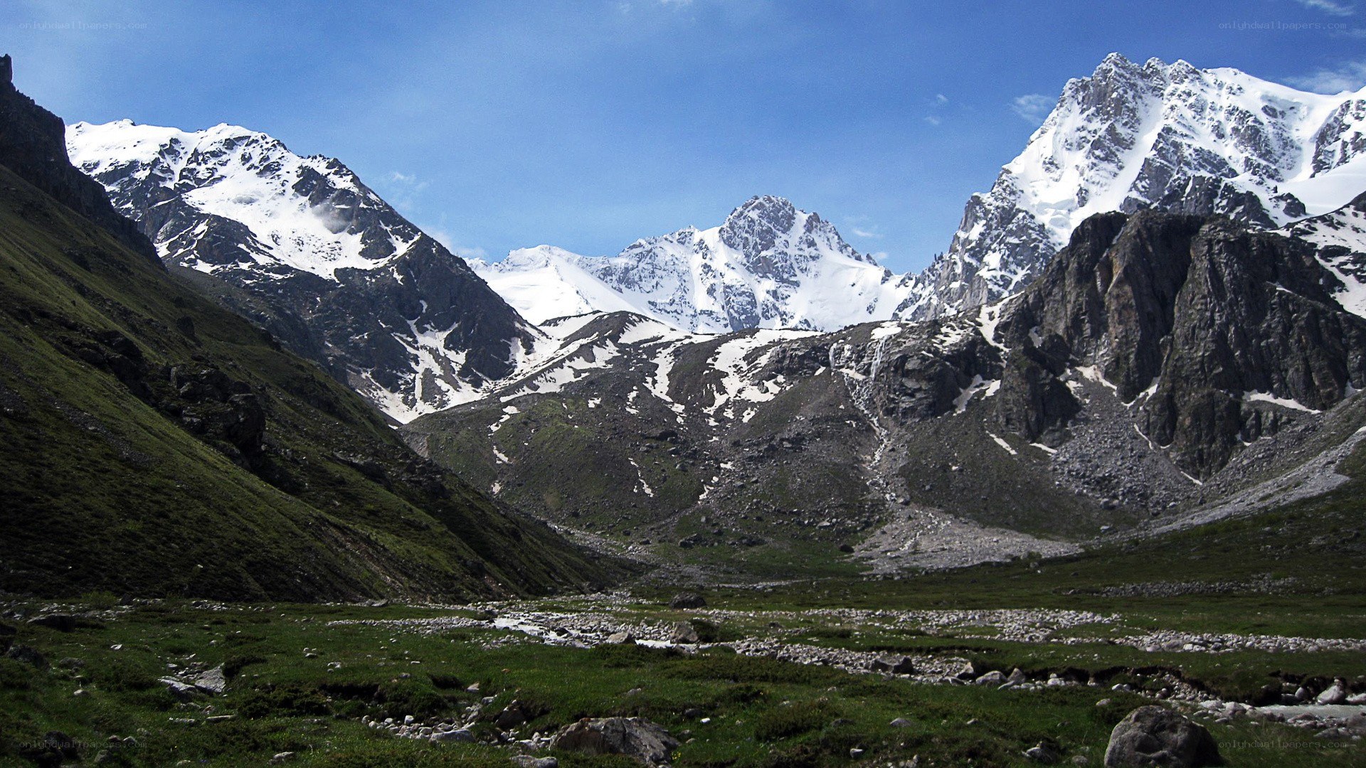 snow-capped mountains in a valley