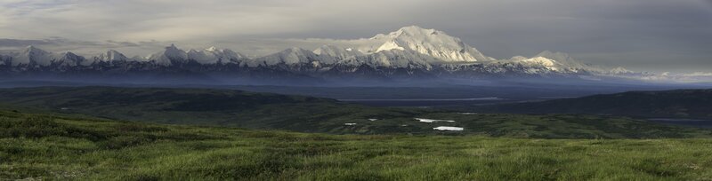 Snow-capped mountains in a vast landscape