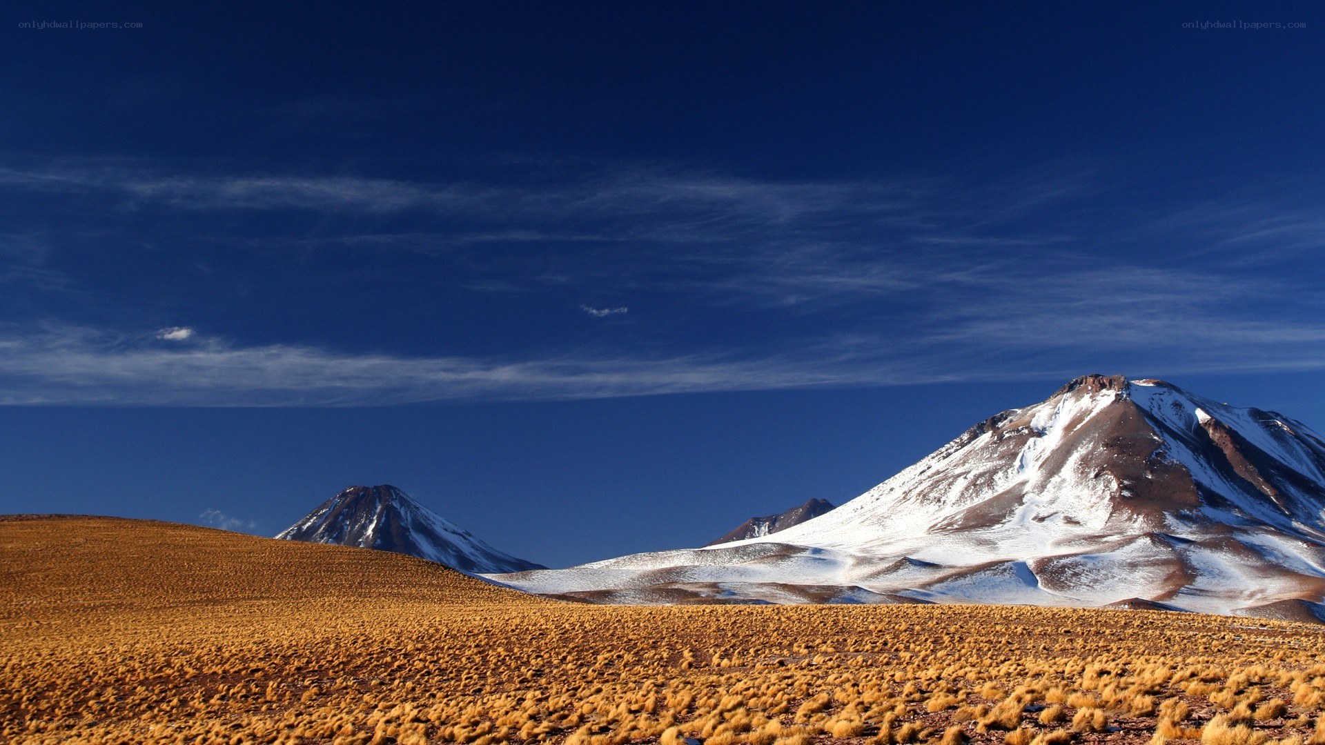 Snow-capped mountains in desert