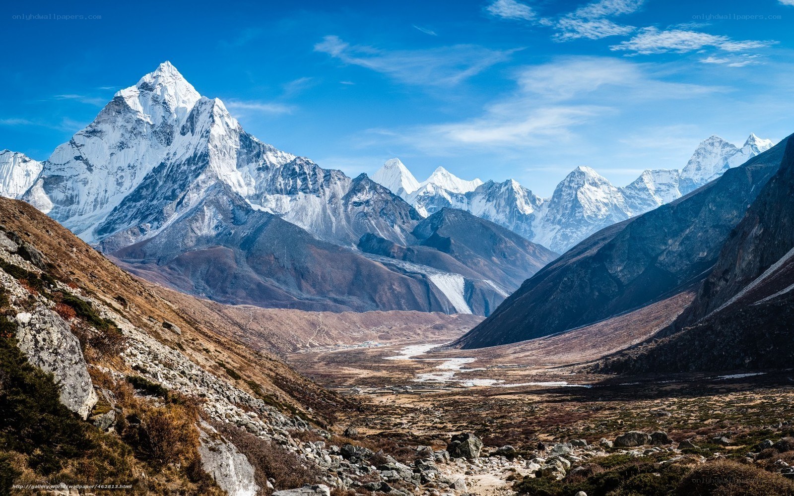 Snow-capped mountains in valley