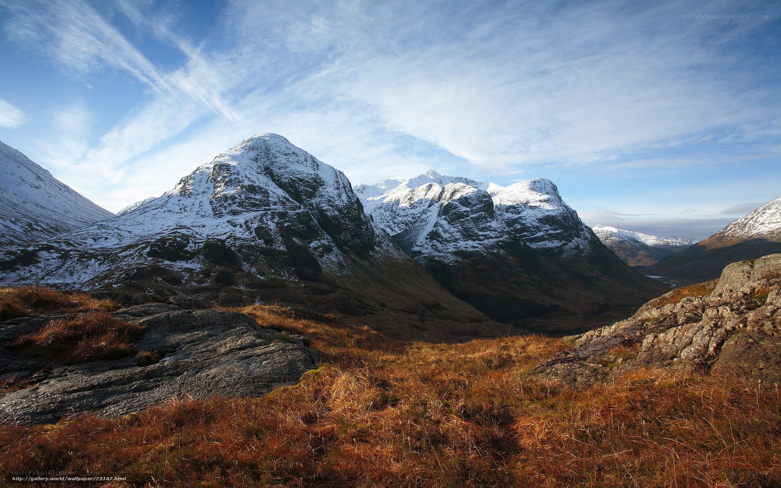 Snow-capped mountains in valley