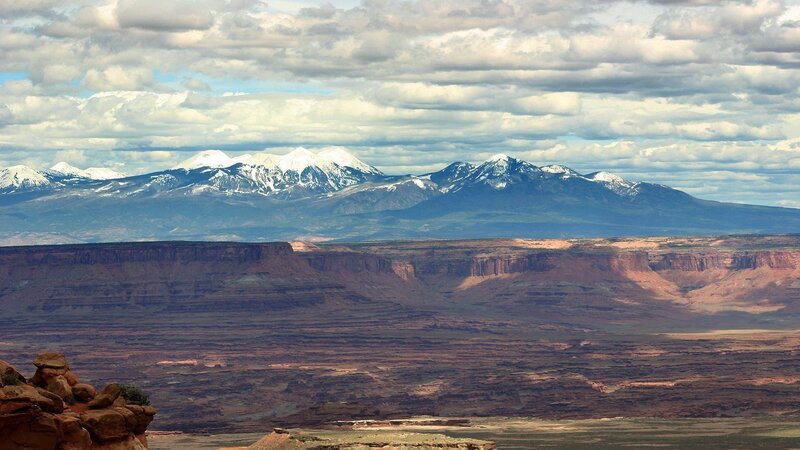 snow-capped mountains over canyon