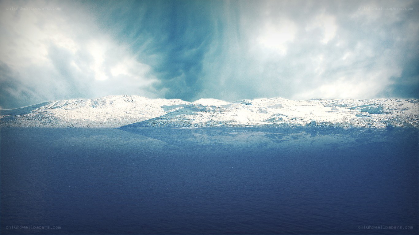 Snow-Capped Mountains Over Water