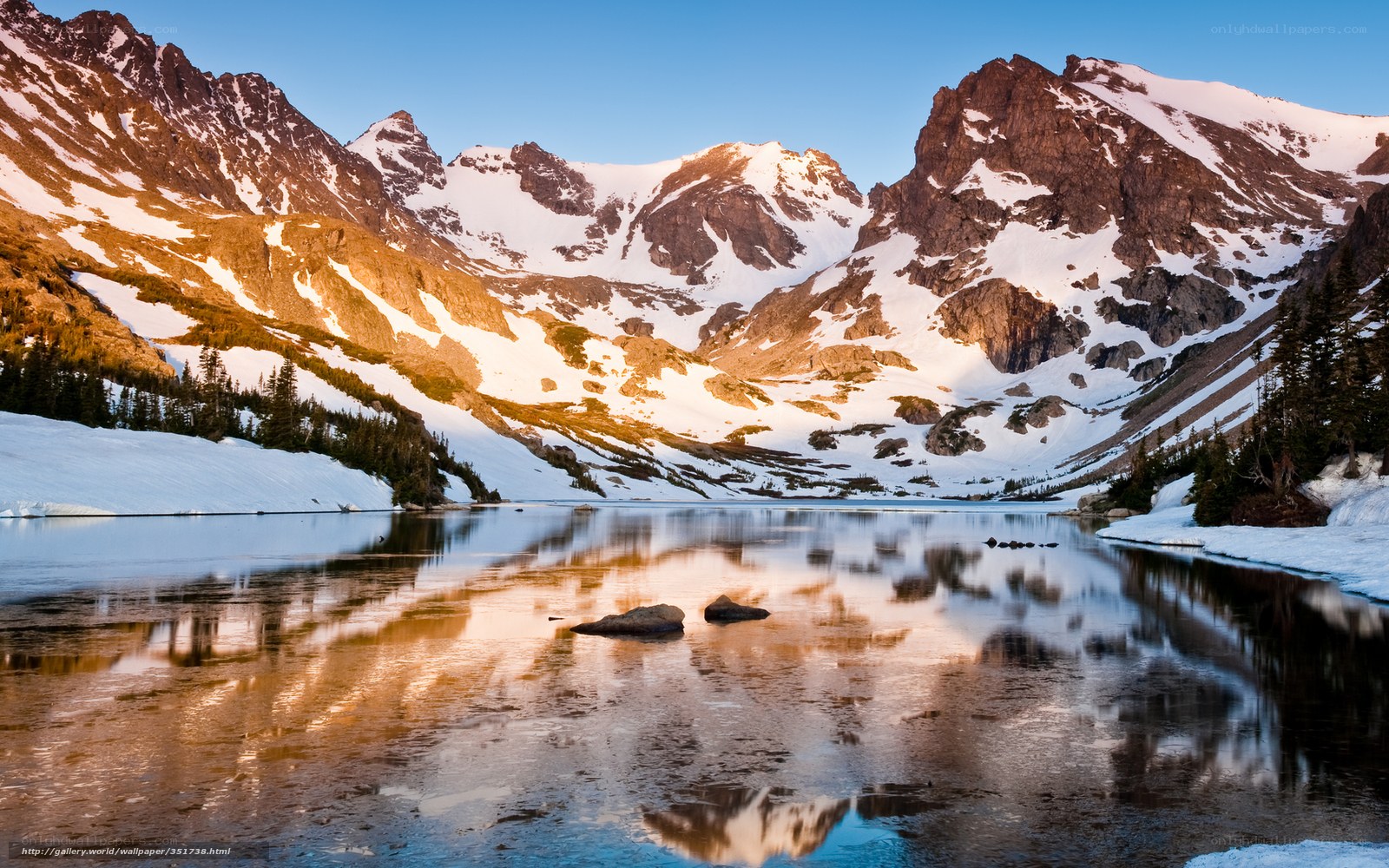Snow-Capped Mountains Reflecting in a Lake