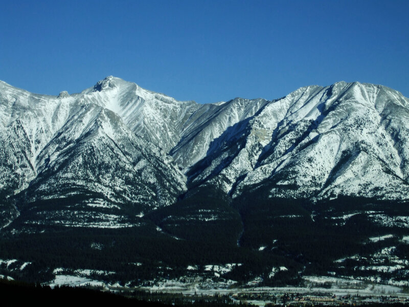 snow-capped mountains under blue sky