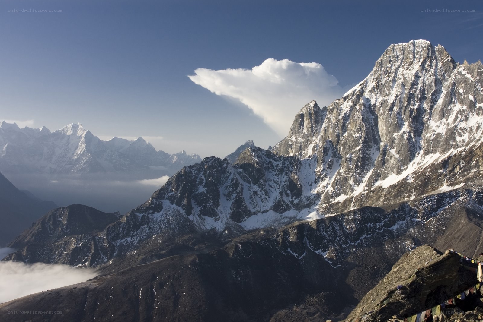snow-capped mountains under blue sky