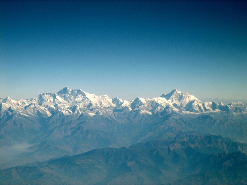 snow-capped mountains under blue sky