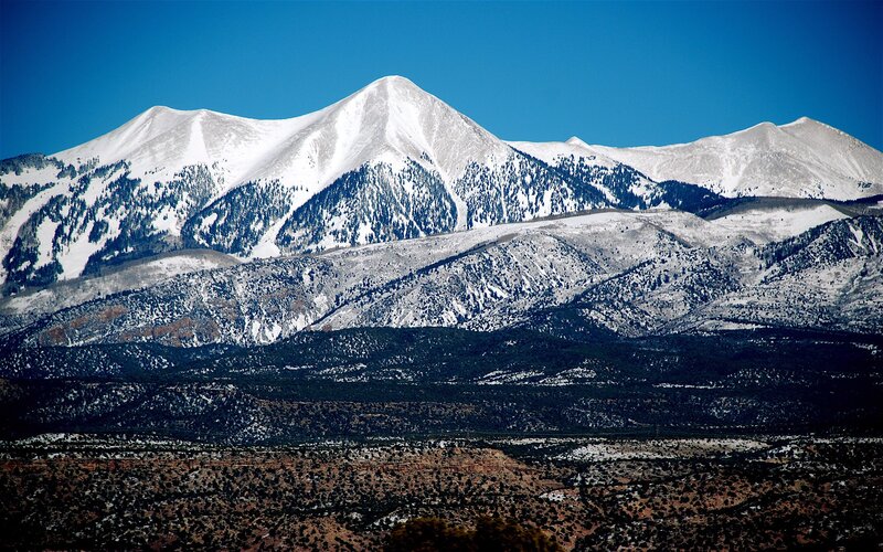 snow-capped mountains under blue sky