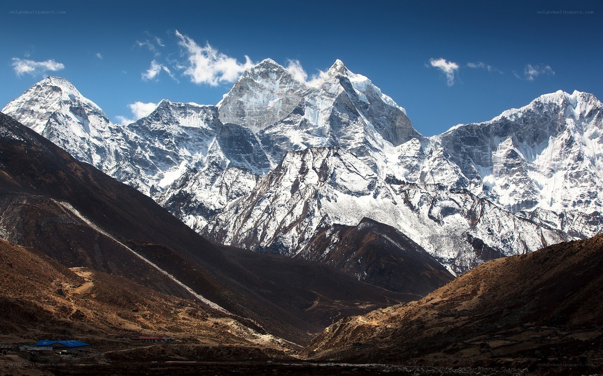 snow-capped mountains under blue sky