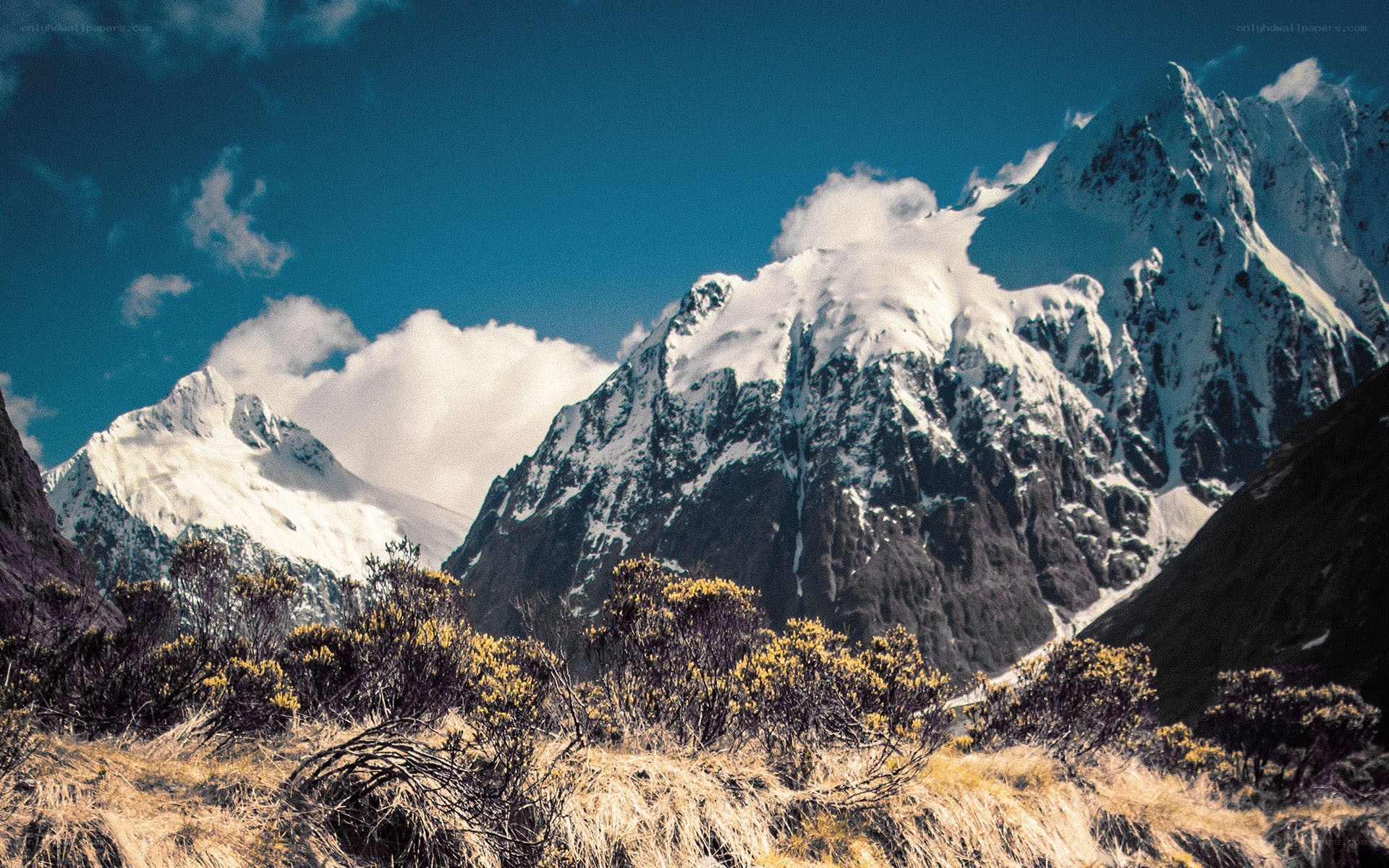 snow-capped mountains under blue sky