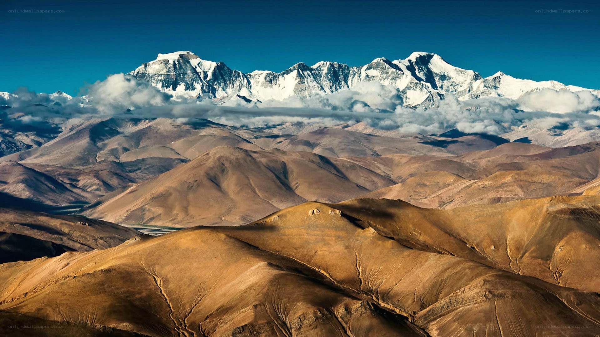 snow-capped mountains under blue sky
