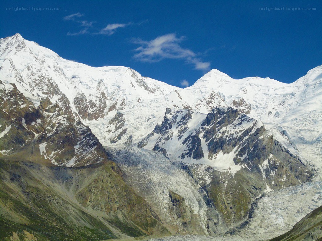 snow-capped mountains under blue sky