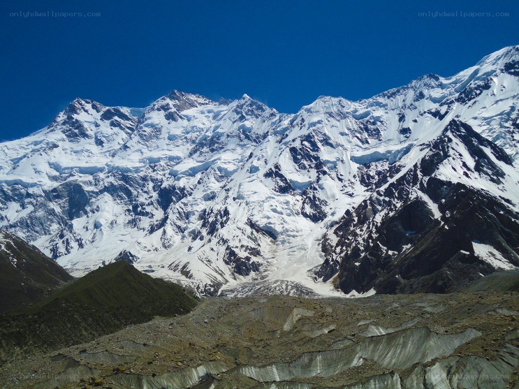 snow-capped mountains under blue sky