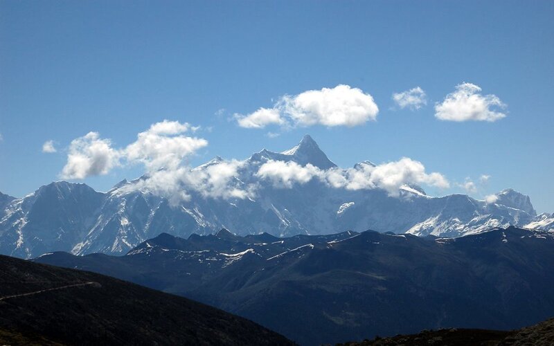 snow-capped mountains under blue sky