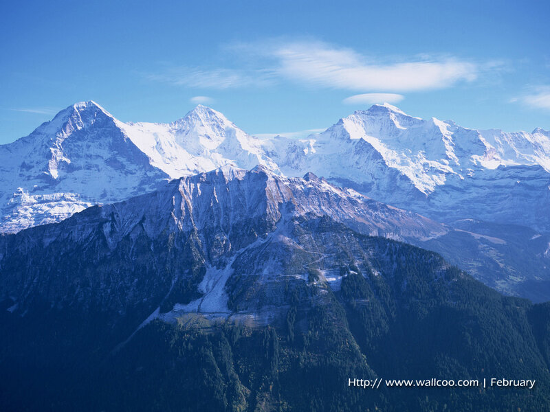 snow-capped mountains under blue sky