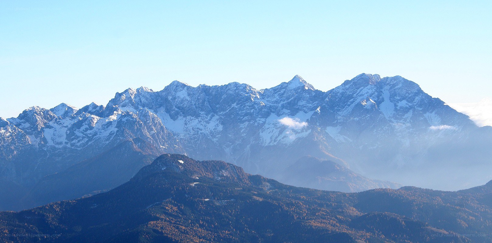 snow-capped mountains under clear sky
