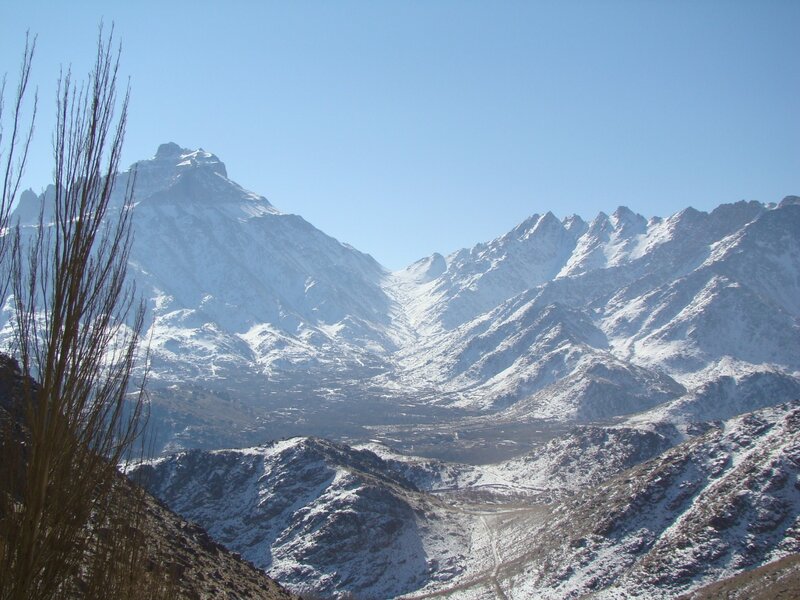 Snow-capped mountains under clear sky